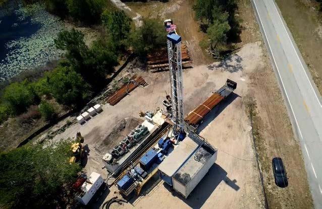 Machinery drilling for a water source.